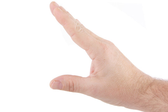 main ouverte sur fond blanc tenant un objet publicitaire