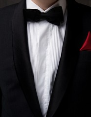 Man wearing tuxedo.