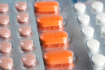Packs of pills isolated on white background.