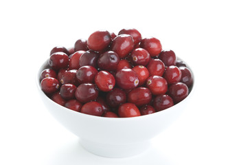fresh cranberries in a white bowl