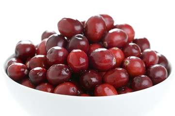 fresh cranberries in a white bowl
