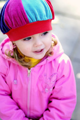 small girl in autumn park