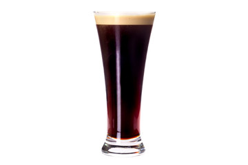 Glass of dark beer isolated on white