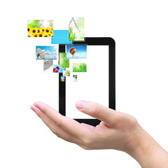 touch pad PC and streaming images virtual buttons on women hand