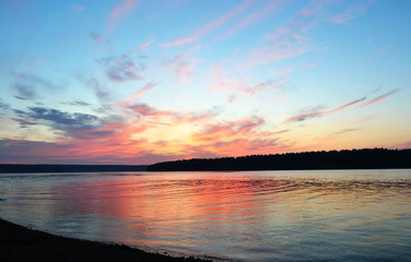 Fototapeta na wymiar Summer sunset over the lake