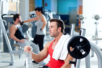 Fototapeta na wymiar man relaxed on gym after fitness sport training