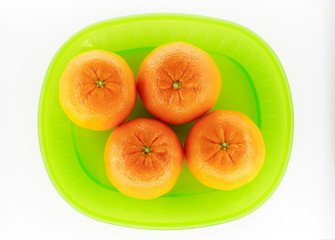 Healthy food series with tangerines on light background