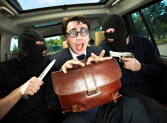 businessman grasped in hostages.