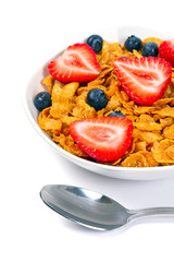 Healthy breakfast with corn flakes and fresh fruits