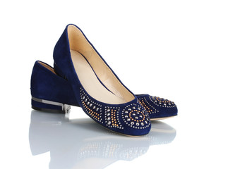 Elegant blue flat shoes for women in stones isolated on white