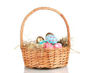 Colorful Easter eggs in the basket  isolated on white