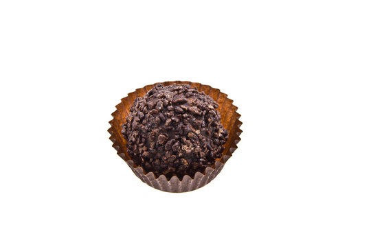 Dark chocolate truffle candy isolated on white