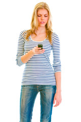 Fototapeta premium Portrait of teen girl writing sms