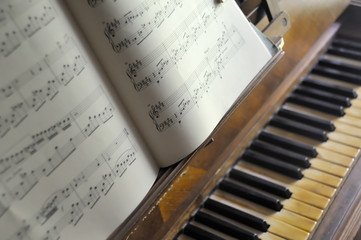 Beautiful light on one partition and an old piano