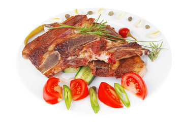 roasted beef meat bone steak on ceramic dish