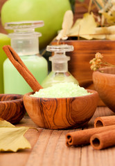Fototapeta na wymiar green herbal salt in the wooden bowl.