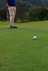 Golf player on the green