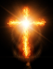 Fototapeta na wymiar cross burning in fire