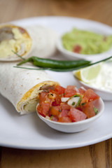Breakfast burrito, in mexican style,with guacamole