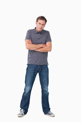 Fototapeta premium Young man with his arms folded