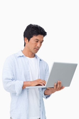 Young male working on his laptop