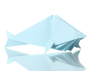 Origami fish out of the blue paper isolated on white