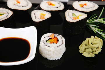 Maki rolls on black