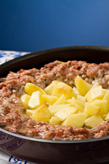 Minced meat pie with potatoes.