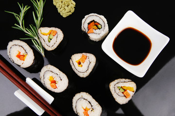 Roll with Avocado and Salmon on black