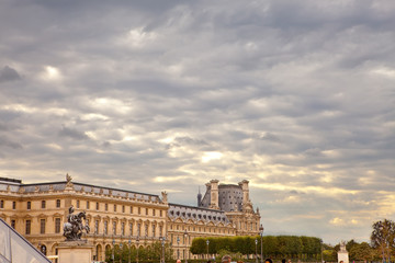 Paris. The cloudy sky over Louvre