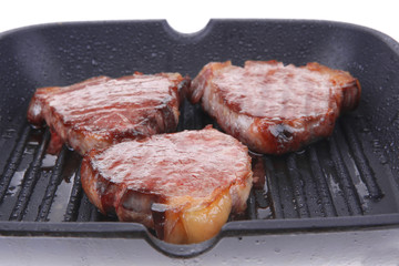 grilled bloody beef steaks