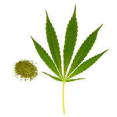 dry cannabis and green leaf
