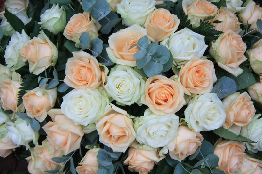 Soft orange and white rose arrangement