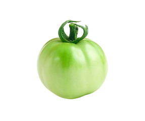 An unripe green tomato isolated on a pure white background.