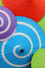 A variety of paper umbrellas wide range of sizes.