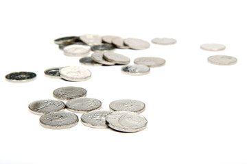 group of silver coins on white background