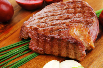 beef fillet mignon grilled and garnished with lettuce