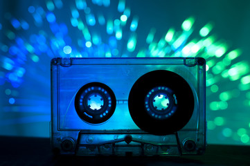 Transparent Cassette tape and disco light background