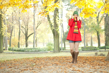 young girl in autumn park