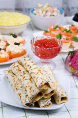 Pancakes with red caviar