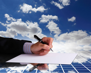 Businessman hand signing documents