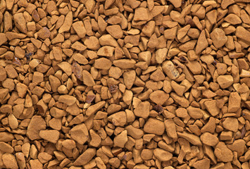 Instant coffee granules macro close up.