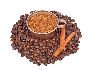 Coffee beans, coffee cup, cinnamon sticks
