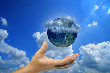 Hand of business man hold earth globe