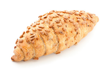 Fresh and tasty croissant over white background