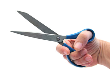 hand holding scissors over white