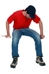 Naklejka premium Tradesman sitting on an invisible object