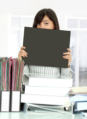 Business woman showing black board