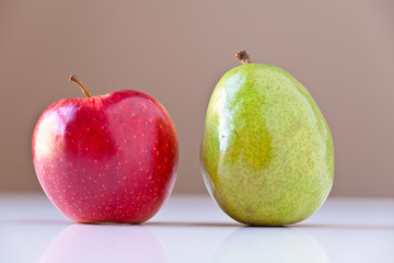 Green Pear and Red Apple