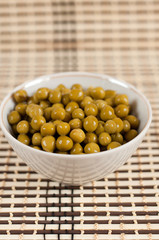 Canned green peas in the salad bowl